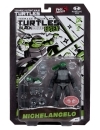Teenage Mutant Ninja Turtles Page Punchers Figurina articulata Michelangelo (Black White & Green) (Red Platinum Edition) 13 cm